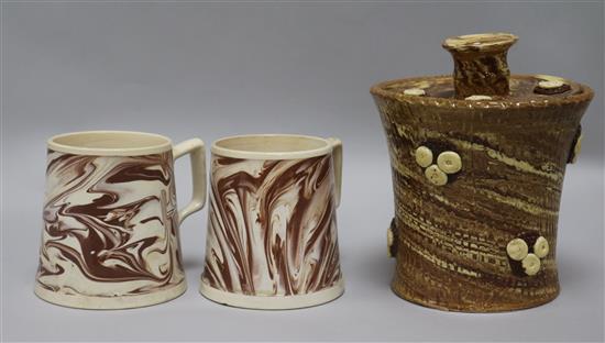 A pair of 19th century Staffordshire agateware mugs, 10cm